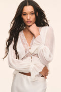 Silk lace blouse in pale stone with sheer long sleeves and V-neck button front