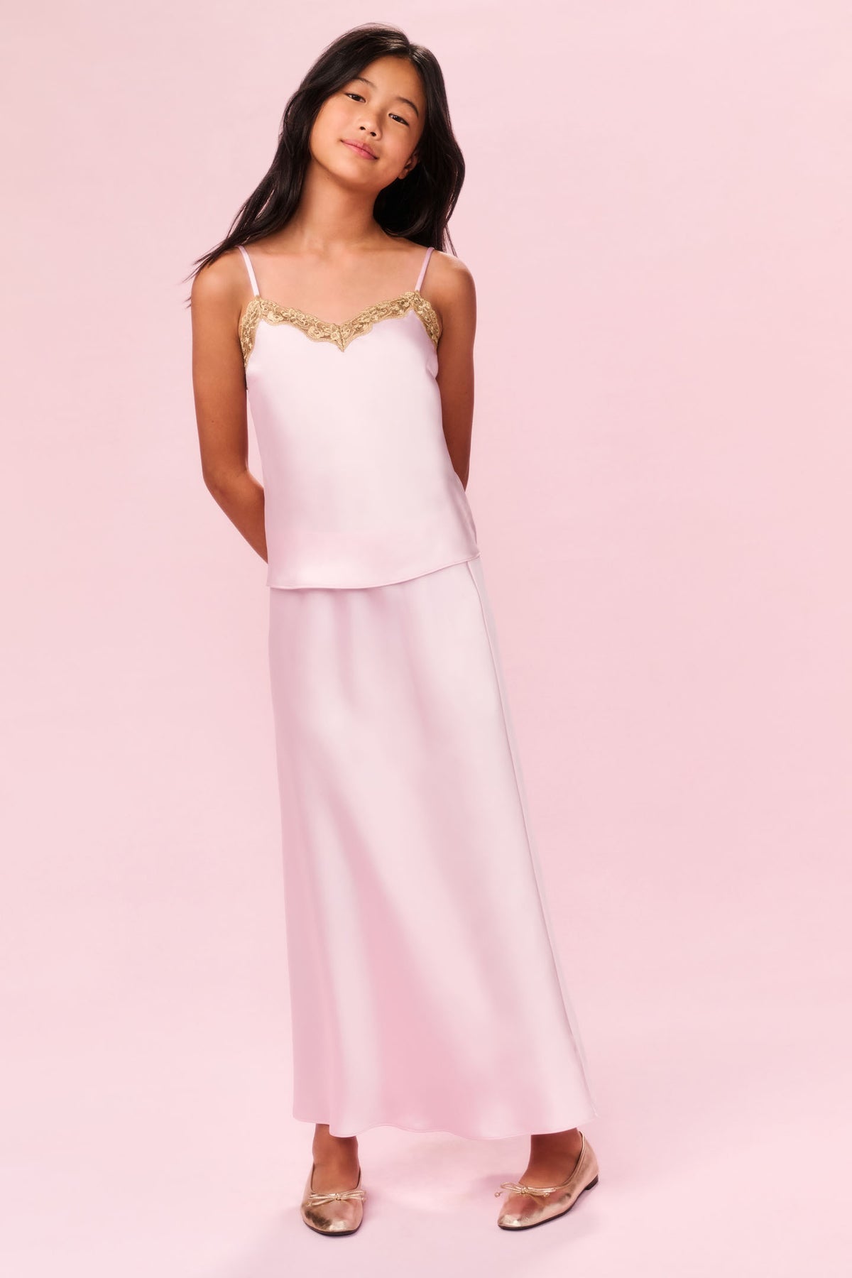 Tween satin maxi skirt in gentle rose pink, straight silhouette, long length.