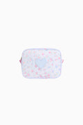 Floral zippered travel pouch with heart patch on light pink background
