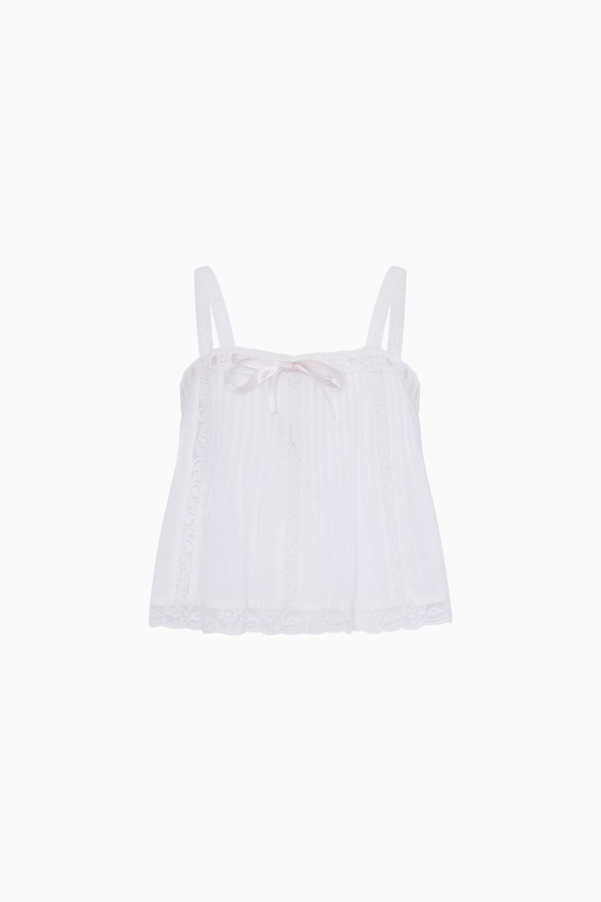 White cotton tween top with spaghetti straps, gathered bodice, ruffled hem