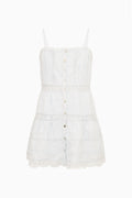 Optic white tween mini dress flat lay with spaghetti straps and button front