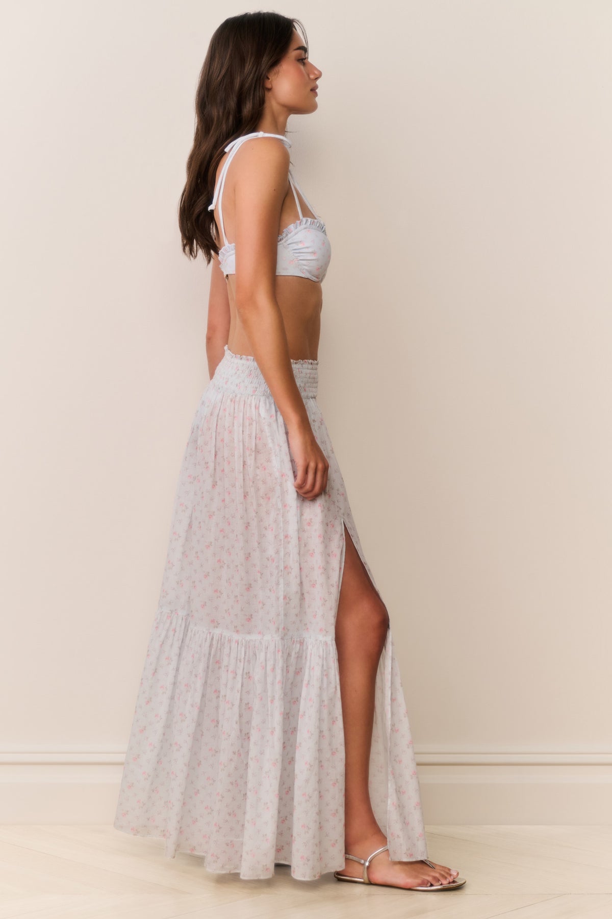 Pastel floral maxi skirt with tiered ruffle layers and side slit