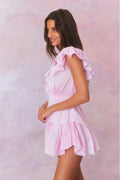 Peony pink mini dress with ruffled short sleeves and layered tiered skirt