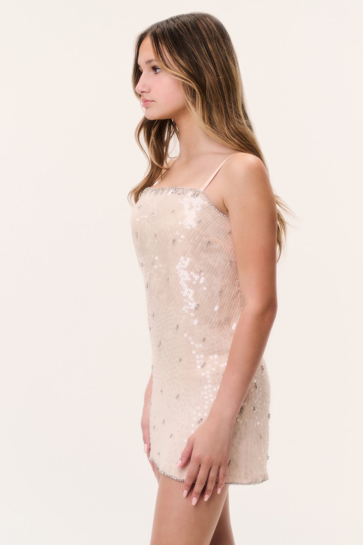 Peach sequin mini cami dress with side profile