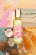 Hair and body perfume mist bottle with gold liquid, metallic cap, and visible coconut
