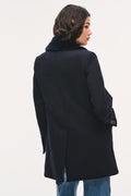 Navy peacoat with faux fur collar, back view with long hem