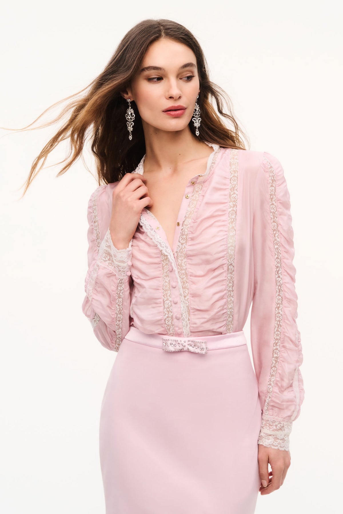 Pink silk lace blouse with V-neck button front and lace ruffle trim, long sleeves