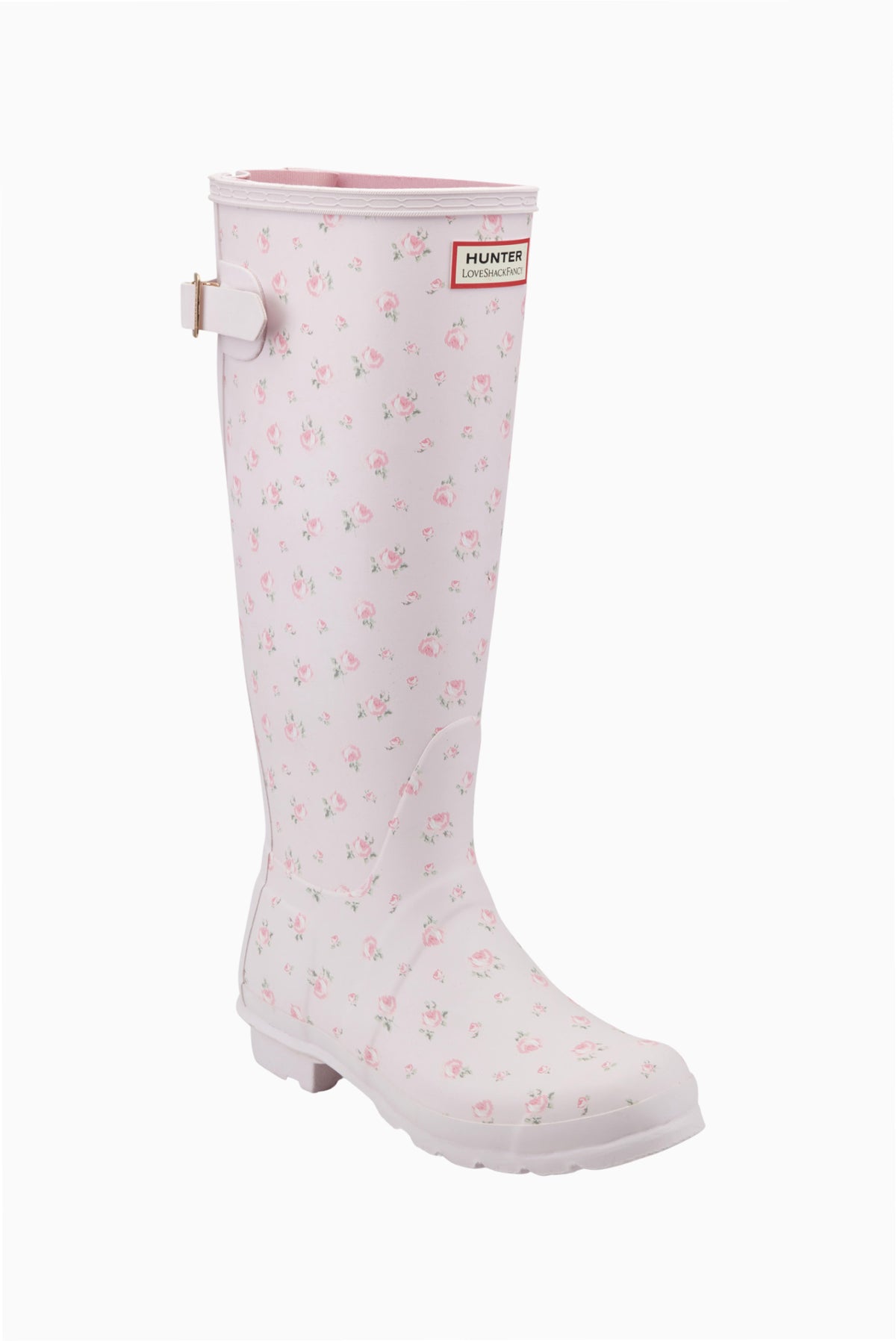 White tall rain boots with small pink floral print, Hunter logo patch and side strap