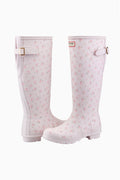 Pair of white tall rain boots with pink floral print and buckle straps