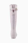 Hunter x LoveShackFancy tall rain boot, light pink with small floral print and buckle strap