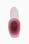 White tall rain boot opening with pink interior lining and pink floral upper