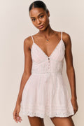 Light pink cotton mini dress with spaghetti straps, button-front, lace hem
