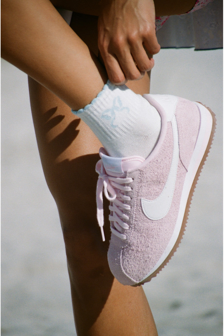 Doyenne cotton bow ankle socks, white with light blue bow logo at ankle