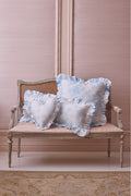 Ruffled lumbar pillow set in light blue with gathered ruffle edges