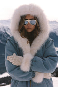Denim convertible jacket with white faux fur hood and trim, zip front and drawcord waist