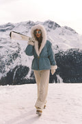 Light blue denim convertible jacket with white faux fur hood, belted waist, zip front