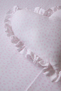 Light pink printed cotton pillow sham with ruffled edge detail