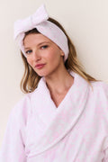 Light pink cotton bath robe with subtle bow print, hood headband and V neckline