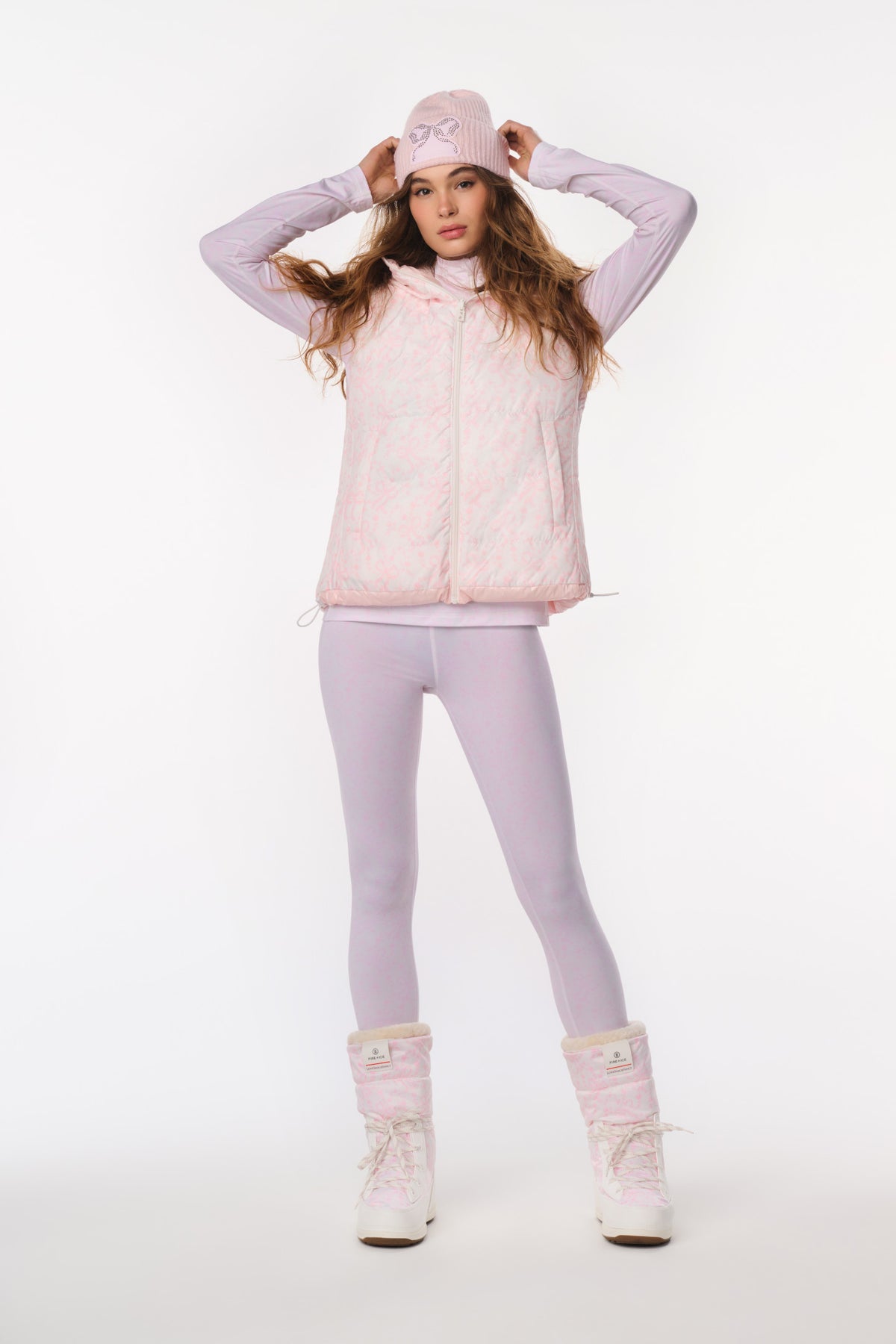 Light mauve leggings with a slim fit and smooth finish, full-length coverage