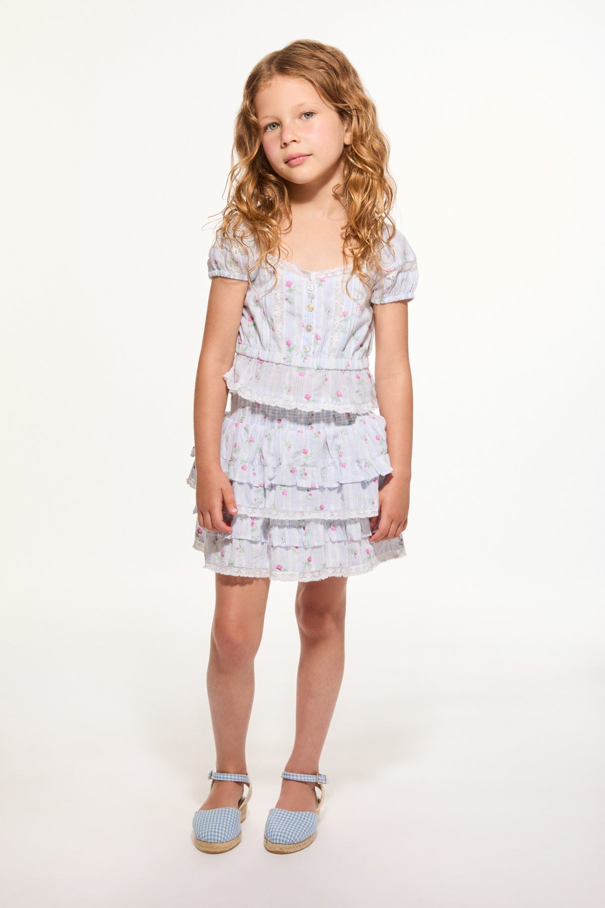 Girls floral striped puff-sleeve top with layered ruffle hem and smocked waist