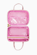 Pink glossy travel box with top handle, open two-compartment interior
