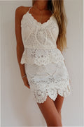 Optic white crochet halter top with layered eyelet pattern and scalloped edges