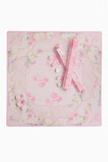 Mahjong mat with pastel floral pattern and scattered tiles