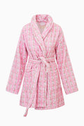 Pink cotton bath robe with hood, tie belt, long sleeves and allover floral print