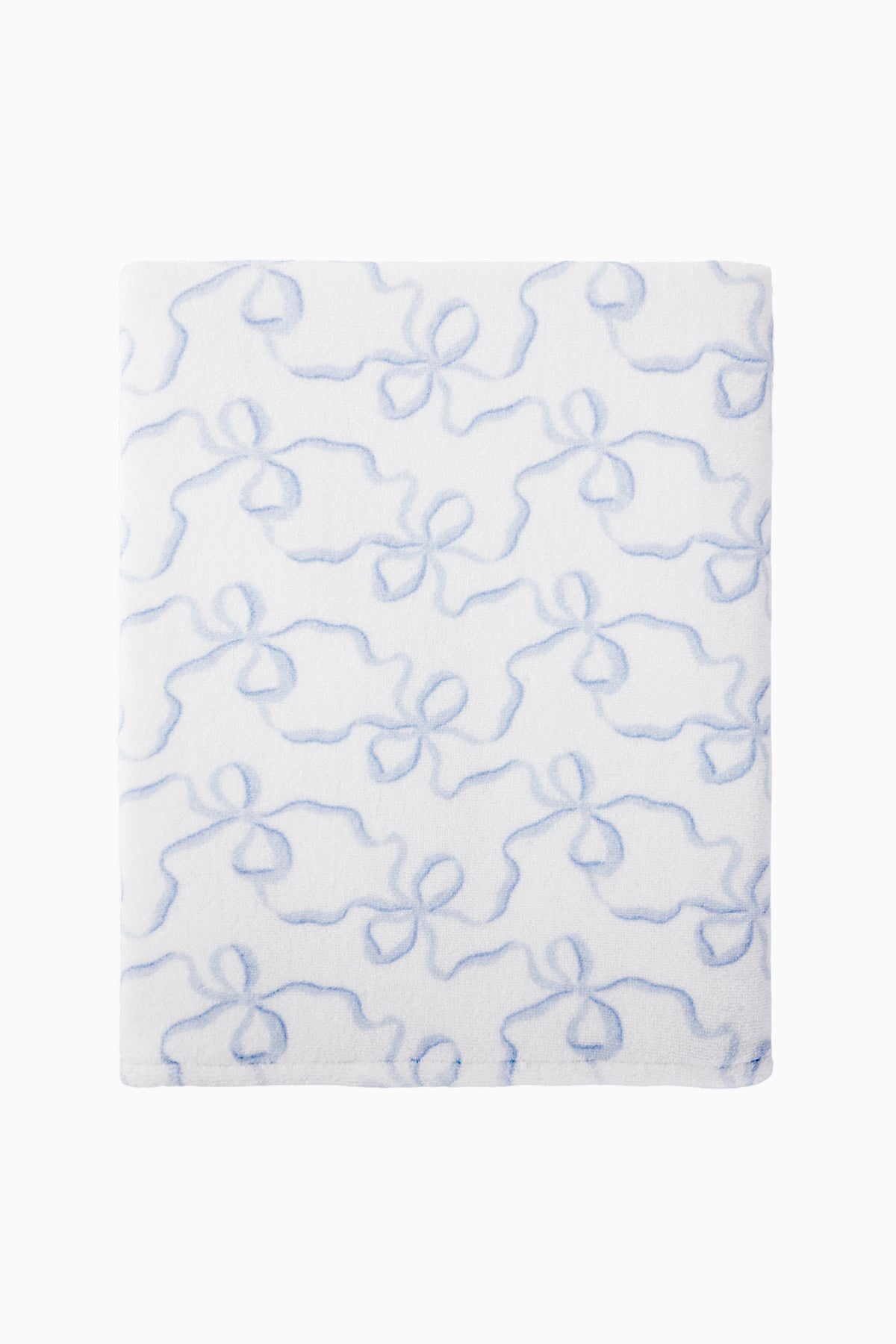 Cotton bath towel, light blue floral bow pattern, flat folded view.