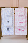 Cotton bath towel, light blue and pink, floral pattern with RH and Rebecca embroidery.