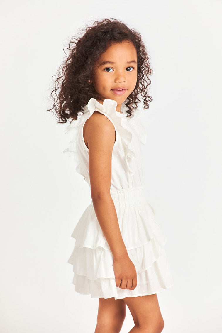 Girls white tiered ruffle dress, side view, smocked waist and sleeveless style