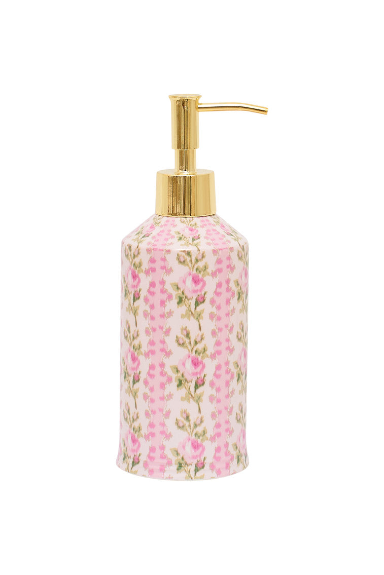 Porcelain soap dispenser with pink floral print and gold pump