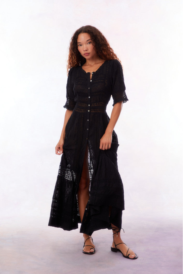 Black maxi dress with V-neck, button front, and semi-sheer lace-textured overlay