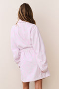 Light pink cotton bath robe back view with subtle bow print and waist tie belt