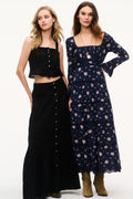 Black cotton maxi skirt with front buttons and tiered hem