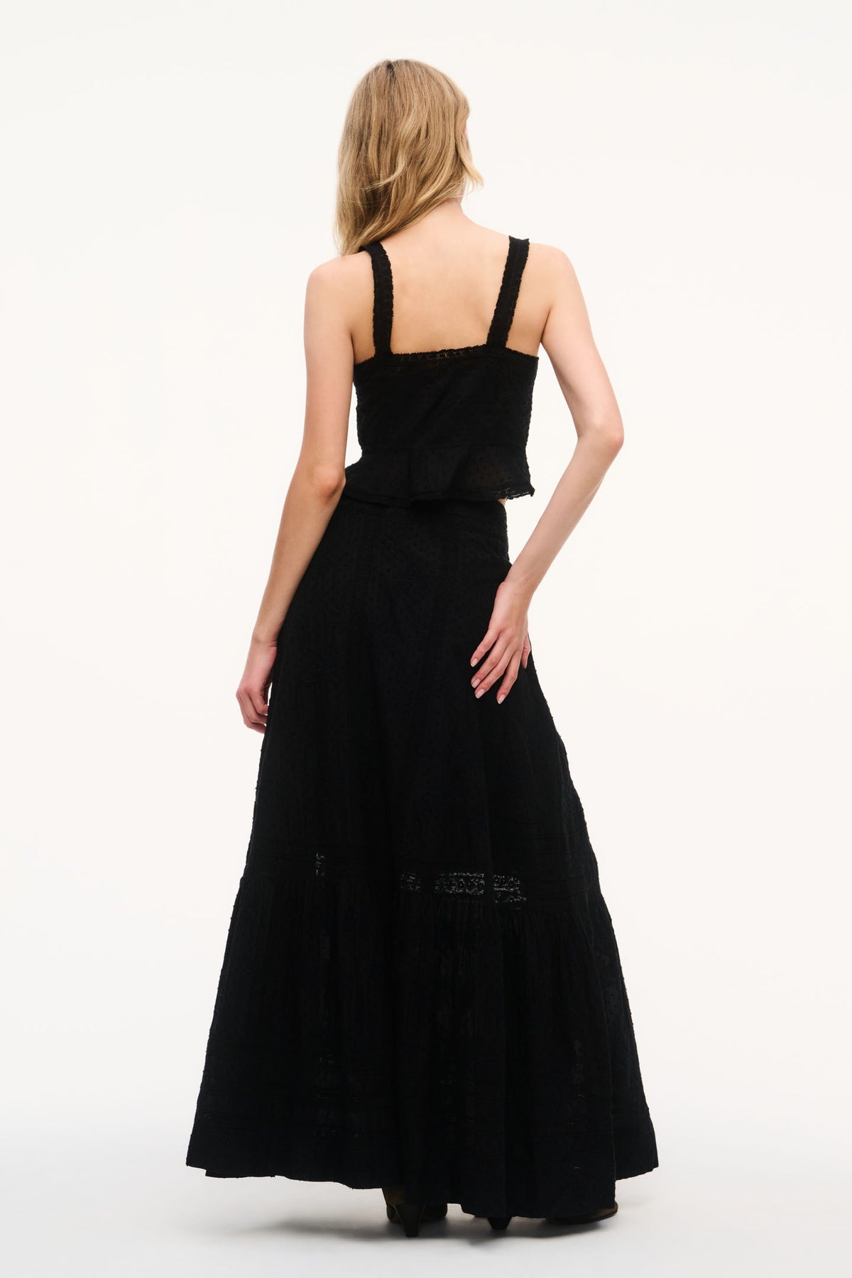 Black cotton maxi skirt with button detail and full-length drape