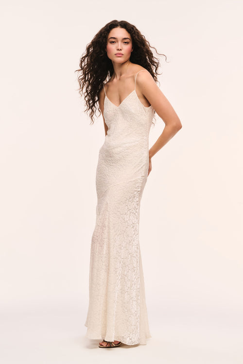 White burnout velvet maxi dress with V-neck and fitted silhouette
