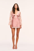 Antiqued blush satin mini dress with lace sleeves and V-neck detail