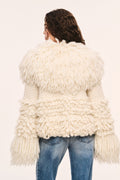 Ivory fringe jacket back view with full shag sleeves and ruffled tiered texture
