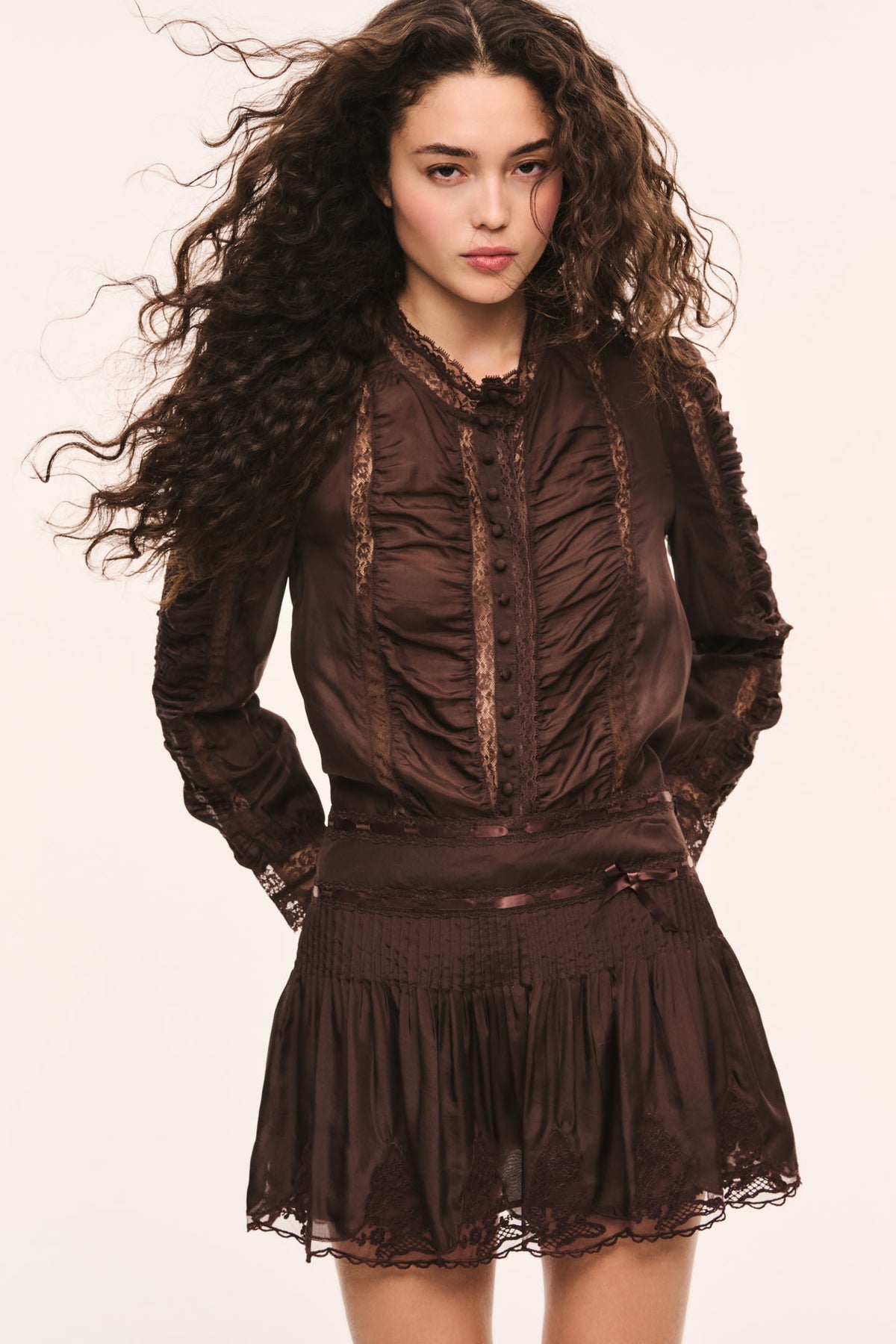Dark brown ruched silk lace blouse with buttoned front and lace-trimmed neckline