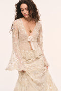 Cream pearl-embroidered mesh top with deep V neckline and long sleeves