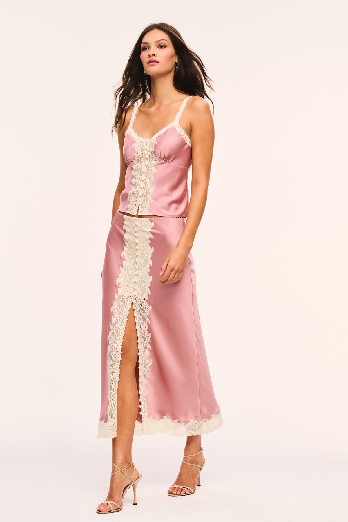 Pink satin slip cami with cream lace front panel and long lace-edged hem