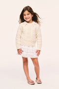 Girls' Mavita mini pullover sweater in cream, cable knit, long sleeves, crew neck and bow details at the neck