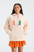 Cream patterned Nacova hoodie with drawstring hood and multicolor graphic text.