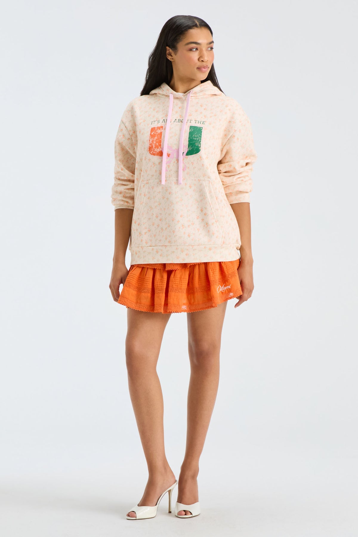 Light peach graphic hoodie with pullover hood and drawstring, long sleeves