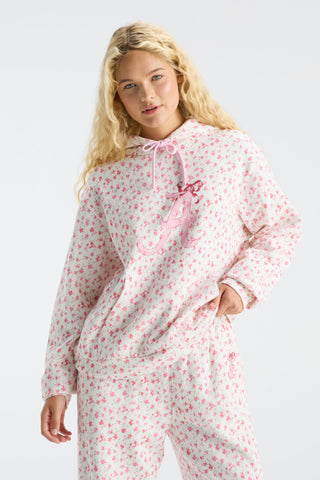 Pink floral-print hoodie with hood, pink drawstring, long sleeves, and kangaroo pocket