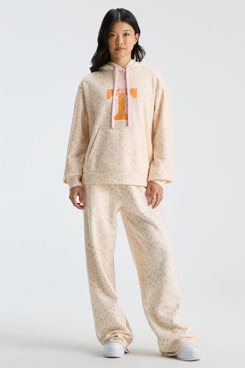 Beige floral pullover hoodie with hood and long sleeves, front graphic