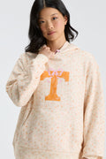 Cream floral pullover hoodie with hood and orange graphic on front