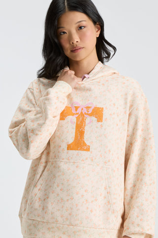 Cream floral pullover hoodie with hood and orange graphic on front
