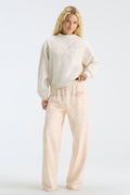 Cream mockneck sweatshirt with "LOVE" graphic and loose sleeves